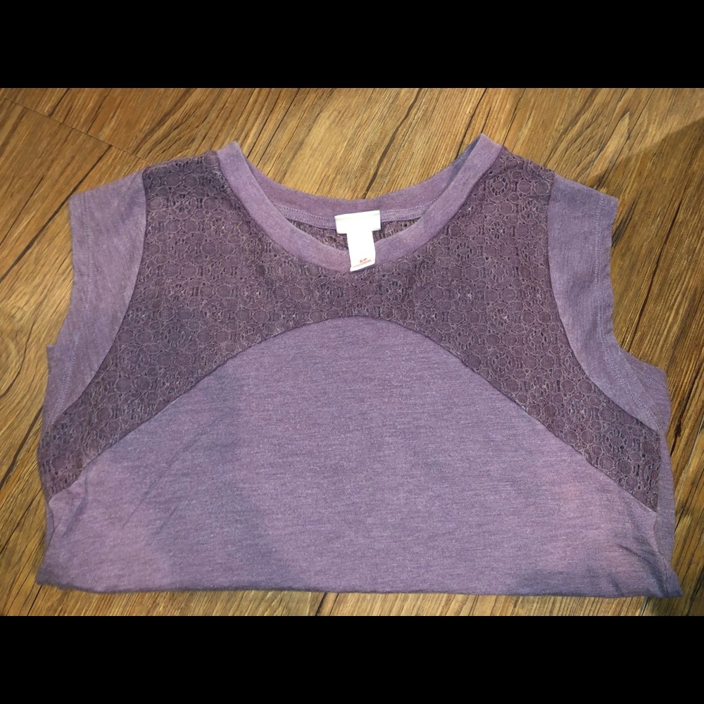 purple no sleeve shirt